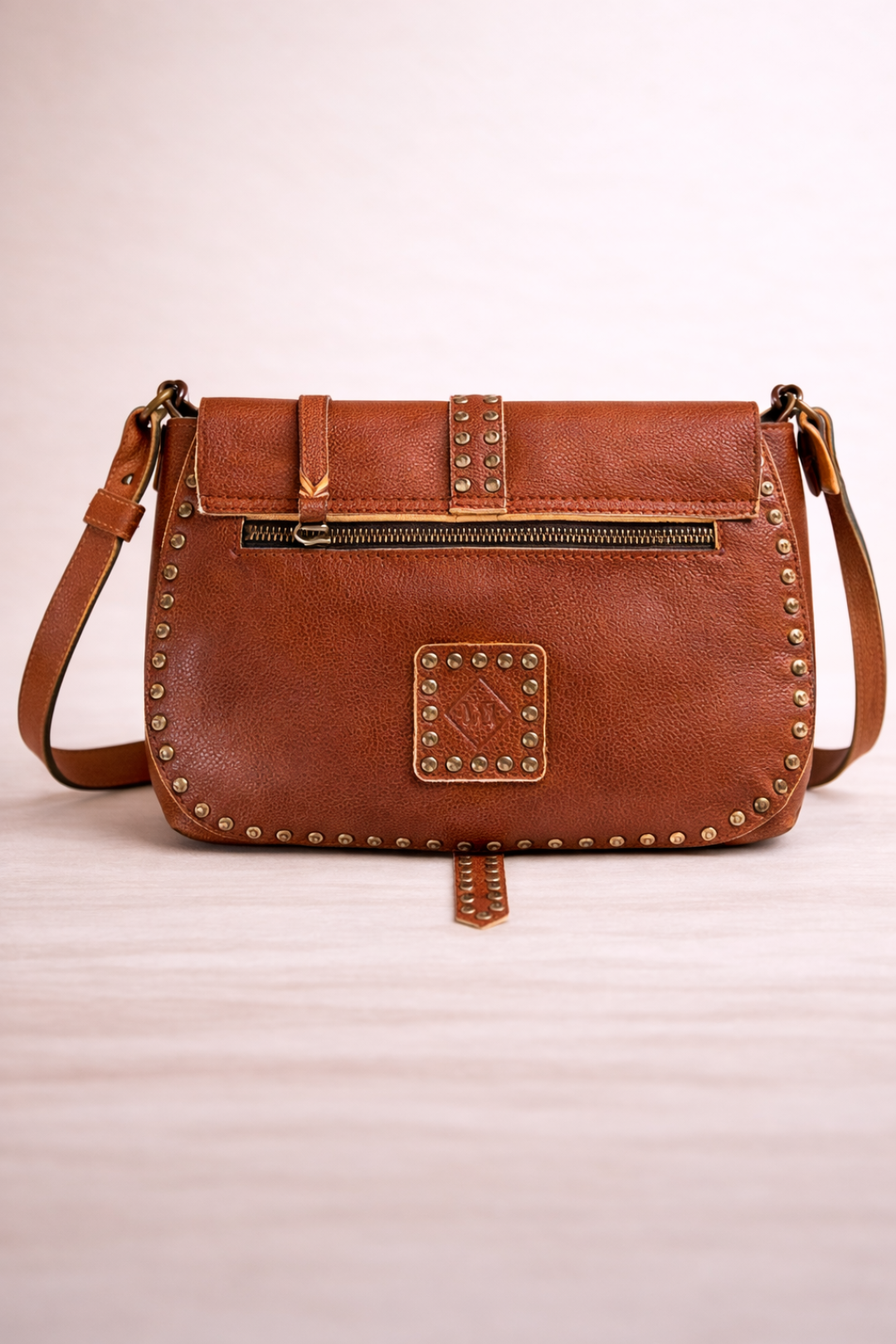 STUDDED LEATHER BELT CAMEL BAG